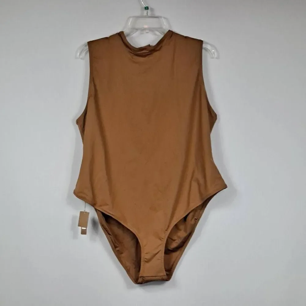 SKIMS‎ Swim mock neck cycle suit. NWT